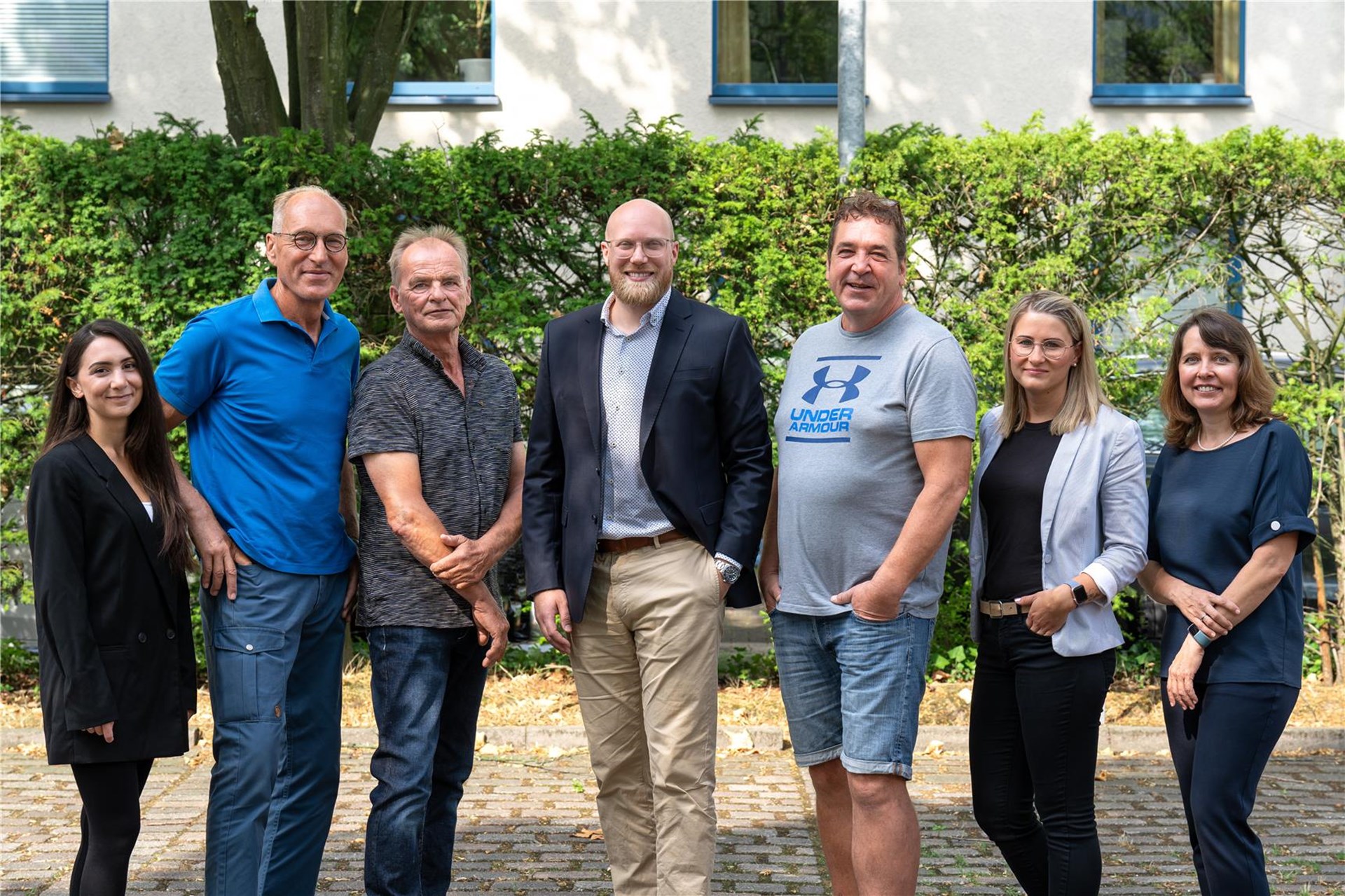 Gruppenfoto des Teams Verwaltung mit Gabriela Kaya, Robert Emde, Ralf Vogt, Jan Dames, Ulrich Fischer, Elena Koch und Marina Rempel